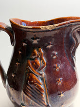 Load image into Gallery viewer, Rockingham Brown Glaze Pitcher With Lady Liberty Stars Ca. 1850’s