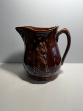 Load image into Gallery viewer, Rockingham Brown Glaze Pitcher With Lady Liberty Stars Ca. 1850’s
