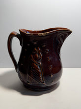 Load image into Gallery viewer, Rockingham Brown Glaze Pitcher With Lady Liberty Stars Ca. 1850’s
