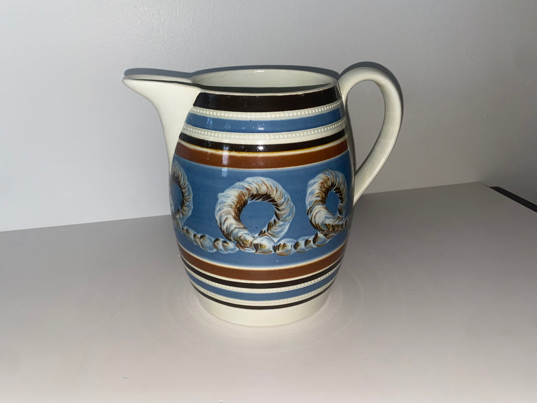Staffordshire Mochaware Mocha Pitcher With Earthworm On Blue Background 1820