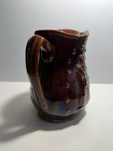 Load image into Gallery viewer, Rockingham Brown Glaze Pitcher With Lady Liberty Stars Ca. 1850’s
