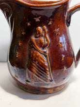 Load image into Gallery viewer, Rockingham Brown Glaze Pitcher With Lady Liberty Stars Ca. 1850’s
