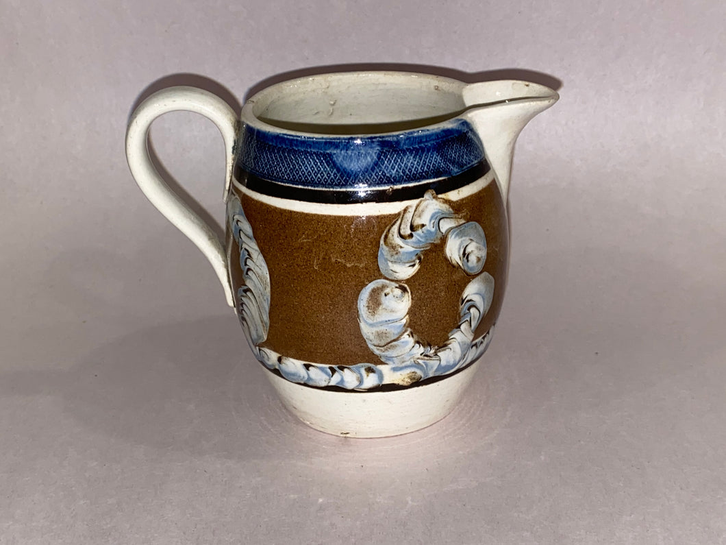 Staffordshire Mochaware Barrel Form Creamer with Earthworm Blue Coggled Rim Ca. 1820